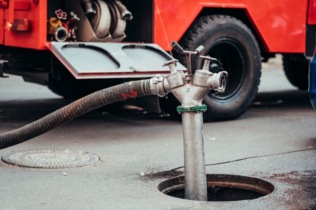Septic tank being pumped for septic system installation near me